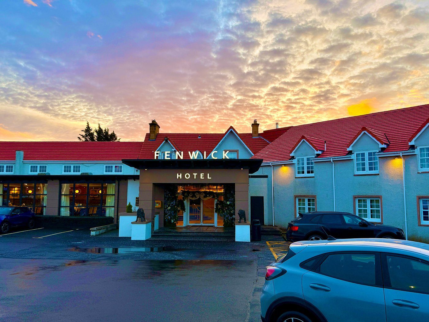 The Fenwick Hotel entrance at sunset